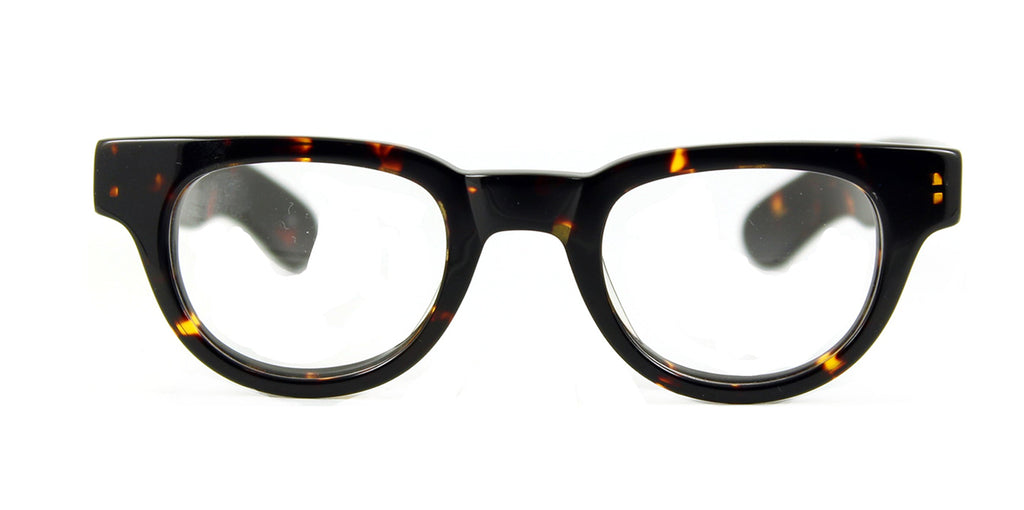 Tortoiseshell eyeglasses on a white background