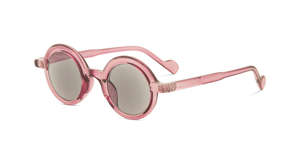 Round pink sunglasses with translucent pink frames and gray lenses, shown on a clean white background.